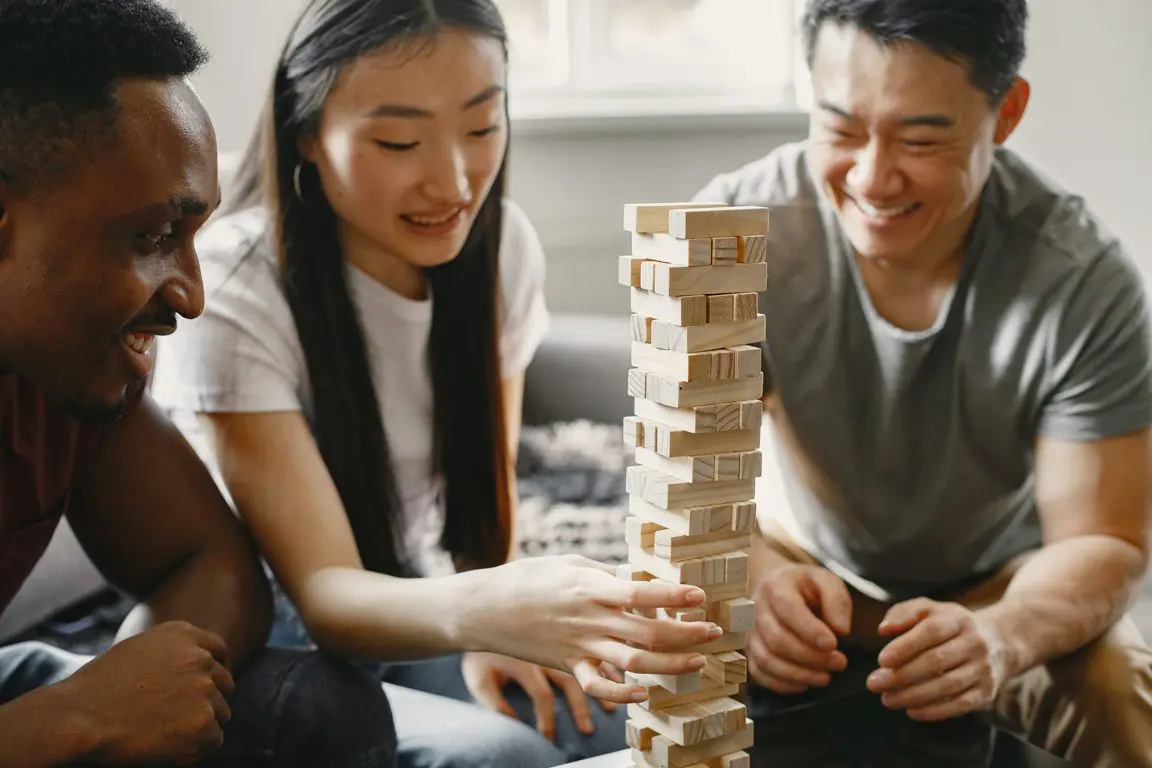 Play is a workout for the brain — a focused, laughing game of block-stacking