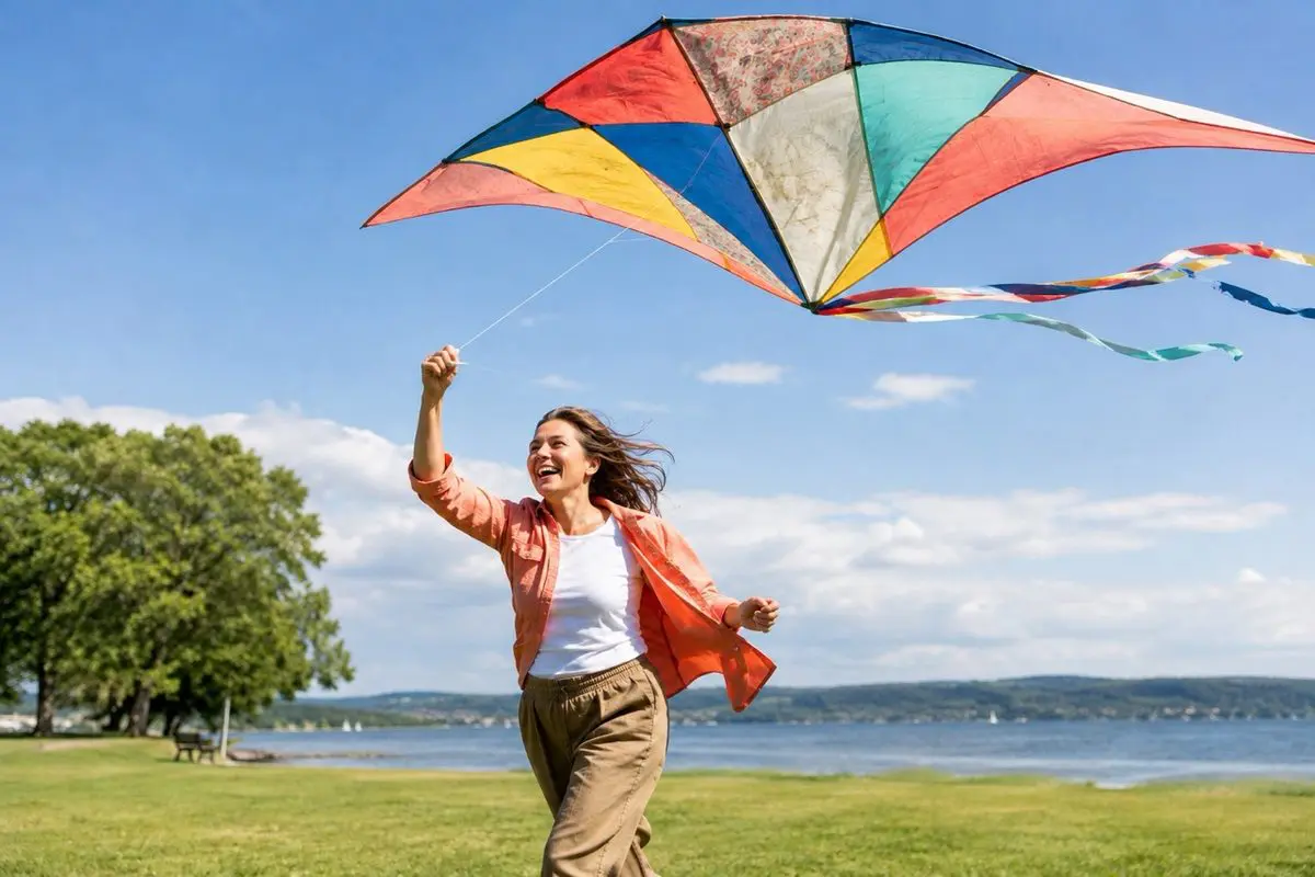 The joyful legacy — flying a kite by the lake