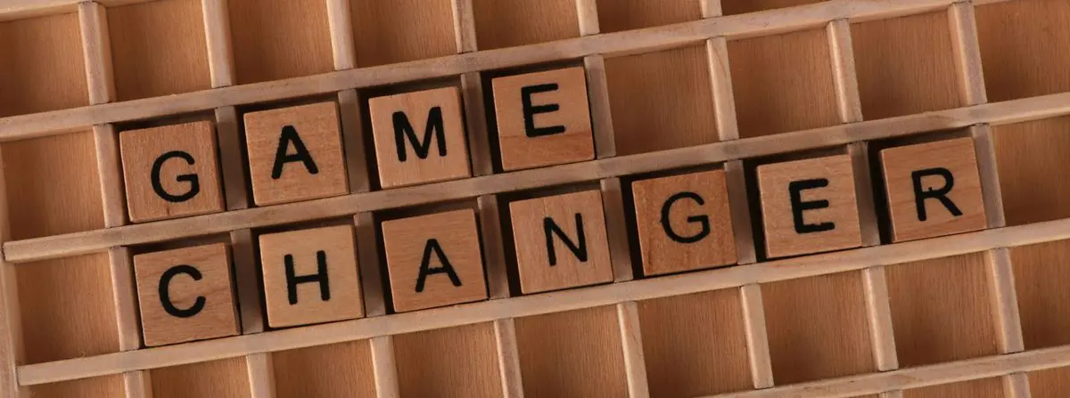 Change is a game changer — letter tiles spelling GAME CHANGER