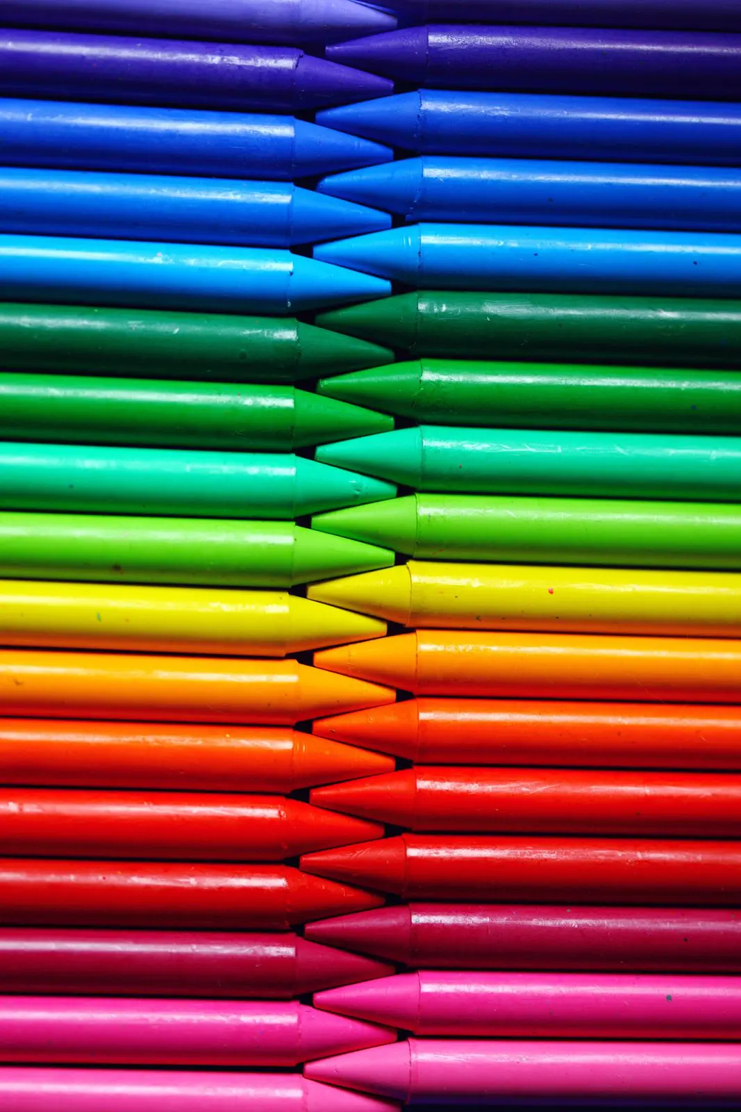 A rainbow spectrum of crayons — every color carries its own mood and energy