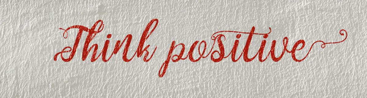 Embracing gratitude as a lifestyle — Think Positive hand-lettered on a wall