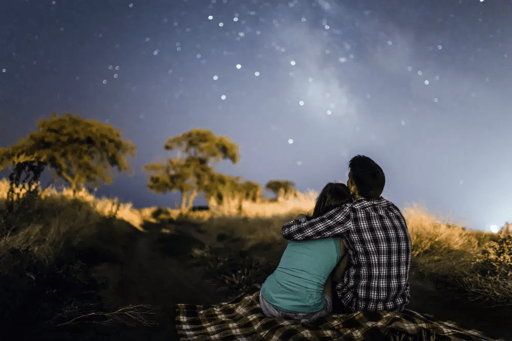 Find a spot away from city lights and gaze at the stars.
