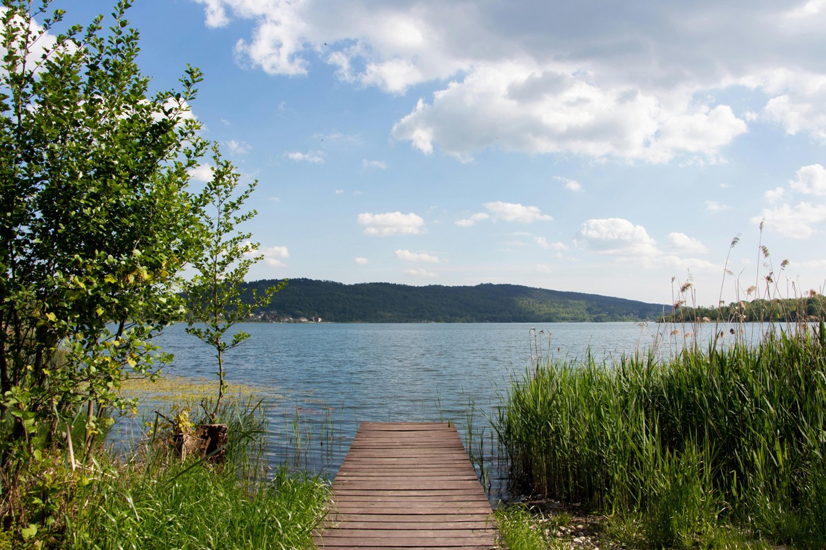 Quiet wooden pier extending over calm water